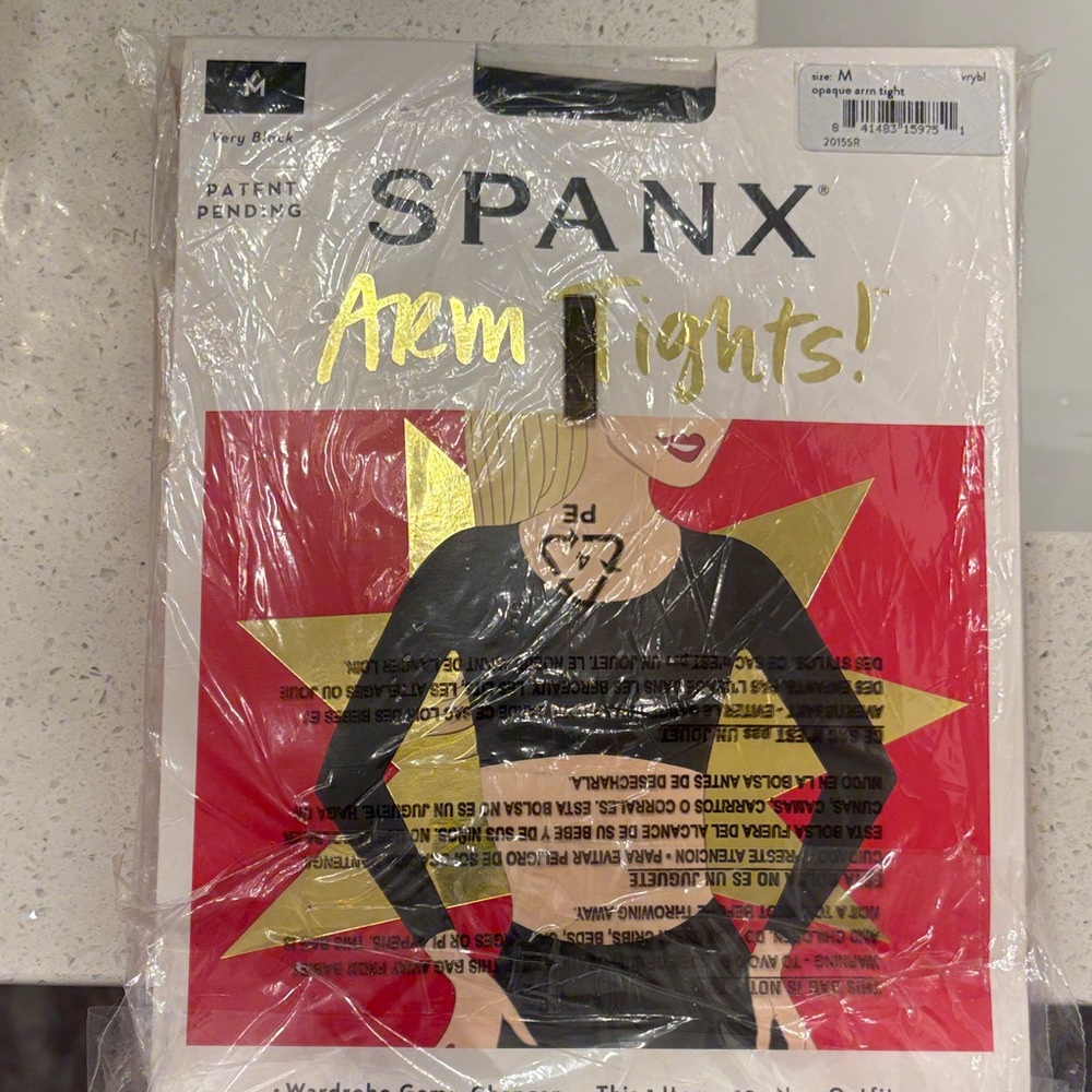 SPANX Arm Tights in Black and Gold